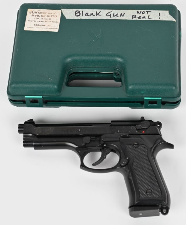 REPLICA M92 BERETTA AUTOMATIC PISTOL NON FIRING: This is a NON FIRING M92 replica. (1) magazine. Barrel has an orange barrel plug at muzzle end. Factory box and manual. CONDITION: Good. Upper ridges of the slide show some edge wear. Handling / stora