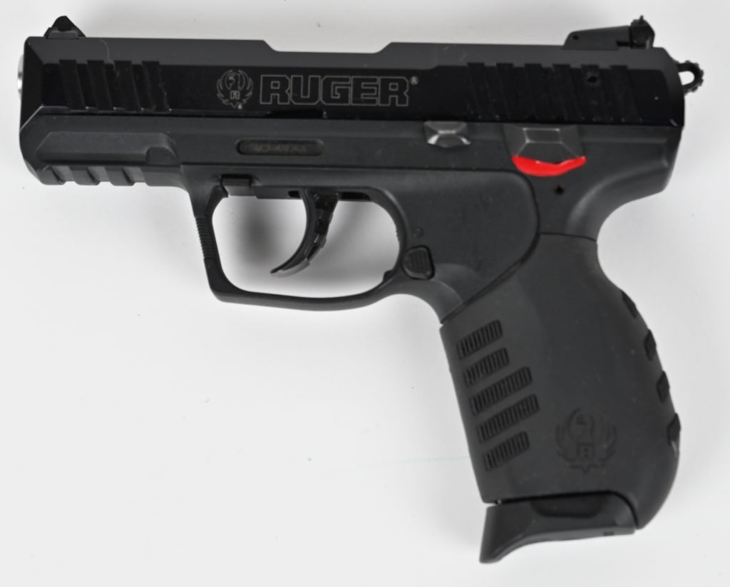 RUGER SR22 SEMI AUTO PISTOL .22LR: SERIAL NUMBER: 362-59756. BARREL: 3 1/2". CALIBER: 22LR. MANUFACTURED: 2013. Standard markings and features. Factory 3-dot sights. Blued slide and black polymer frame. Includes factory 10 round blued 