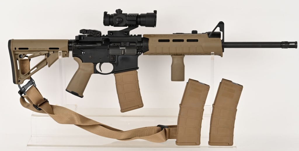 TRICKED OUT ! RUGER AR-556 SEMI AUTO RIFLE 5.56X4: SERIAL NUMBER: 852-74721. BARREL: 16". CALIBER: 5.56X45MM. MANUFACTURED: 2016. Standard weight barrel - 1/8 twist rate. Post front sight, with Ruger flip up rear. Blued/phosphate finish. Sports a Stre