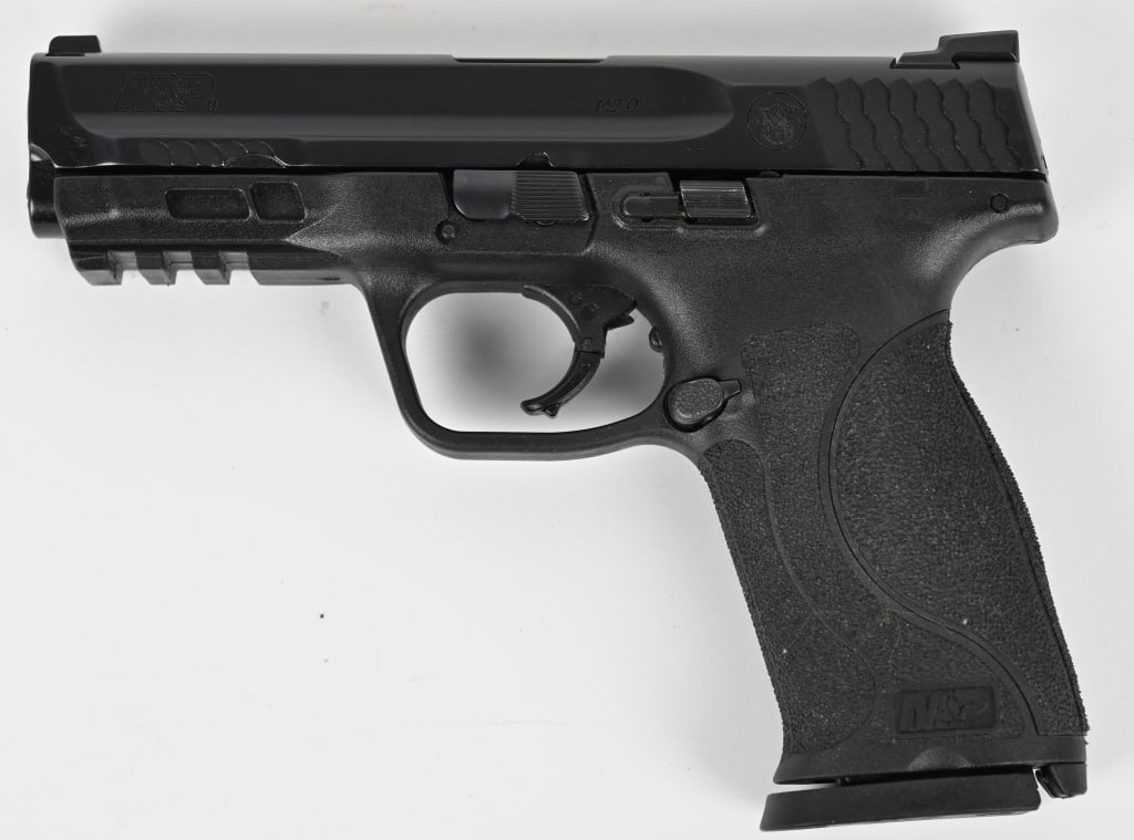 SMITH & WESSON M&P-9 m2.0 SEMI-AUTO PISTOL: SERIAL NUMBER: NJS3861. BARREL: 4". CALIBER: 9MM. MANUFACTURED: 2020s. Blackened slide and barrel with 3-dot sights. Black polymer frame with (1) 17 rd. Magazine. CONDITION: Very Good. Metal retains 9