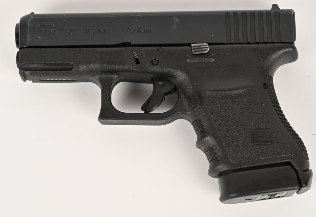 GLOCK MODEL 30 AUSTRIAN SEMI-AUTO PISTOL: SERIAL NUMBER: LPK652. BARREL: 3 5/8". CALIBER: 9X19. MANUFACTURED: 1990s. Made in Austria. 3-dot sights, matte blued slide, and black polymer frame. Includes one factory 10 round magazine. CONDITION: