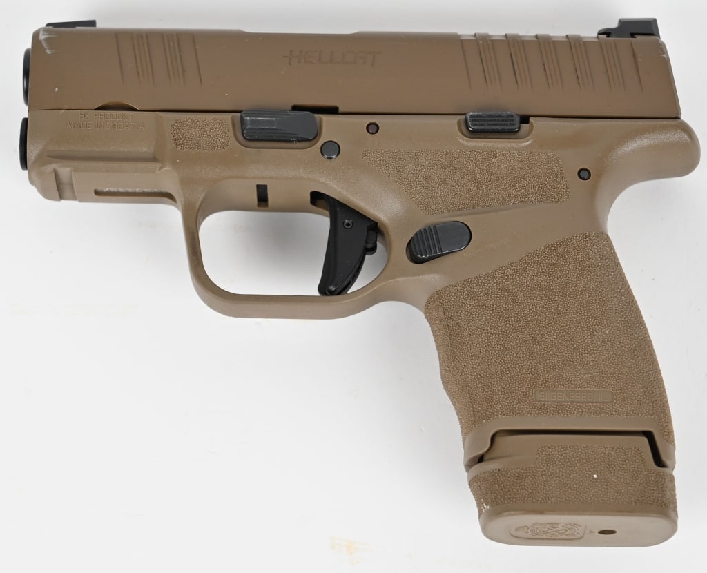 SPRINGFIELD ARMORY HELLCAT SEMI AUTO PISTOL: SERIAL NUMBER: BY523354. BARREL: 3". CALIBER: 9x19. MANUFACTURED: 2020s. Made in Croatia for Springfield Armory. Factory sights, matte FDE slide and textured black polymer frame. Includes factory 13 r