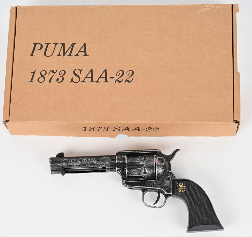 PUMA MODEL 1873-22 REVOLVER BY CHIAPPA W/ BOX: SERIAL NUMBER: CF1008399. BARREL: 4 ?". CALIBER: 22LR. This six shot revolver manufactured by Chiappa for Legacy Sports International in their PUMA brand features antique black/silver finish with synt