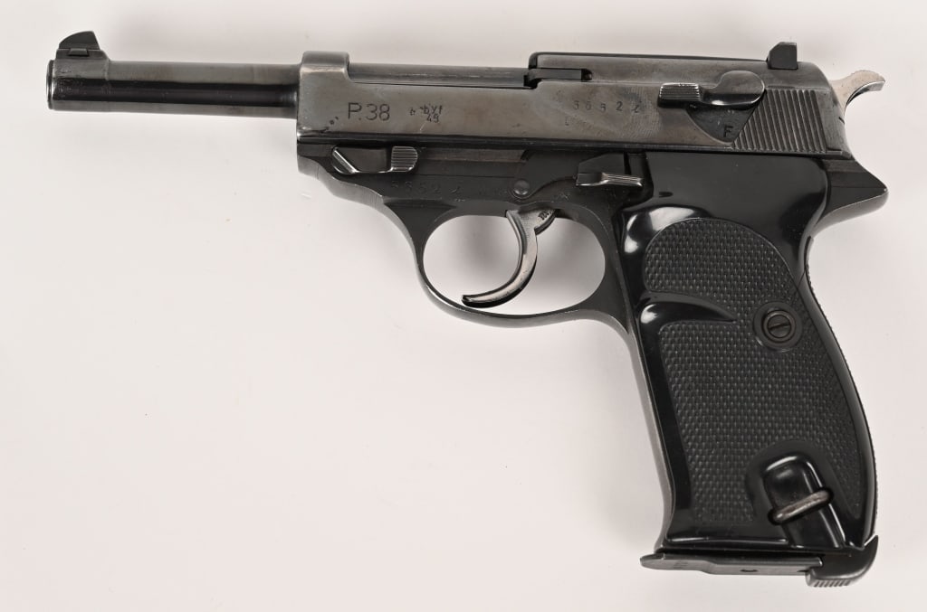 WW2 GERMAN P38 BYF44 CODE SEMI AUTO PISTOL 9MM: SERIAL NUMBER: 5652i. BARREL: 4 7/8". CALIBER: 9MM. MANUFACTURED: 1943. Produced by Mauser under the code BYF in 1943 with blue finish and black bakalite grips. Matching numbers with eagle 135 inspect