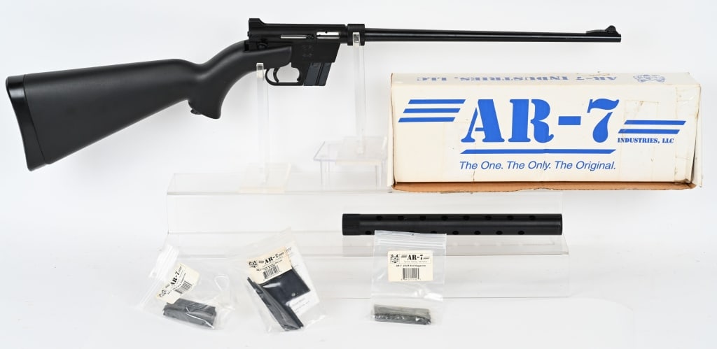 AR INDUSTRIES EXPLORER TAKEDOWN SURVIVAL RIFLE: SERIAL NUMBER: D005113. BARREL: 16". CALIBER: .22 LR. Produced by AR Industries. Features: 16" barrel with blade front sight and peep sight integral to the receiver. Stock houses the barrel (1) 8 roun