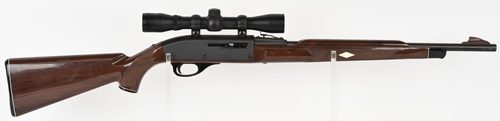 REMINGTON NYLON 66 SEMI AUTO 22 RIFLE: SERIAL NUMBER: A2409413. BARREL: 19.5". CALIBER: 22LR. MANUFACTURED: 1985. Mohawk Brown, blue steel, sporting sights, tube fed through butt. Sports a BSA Classic 4X scope. CONDITION: Metal is Good. St