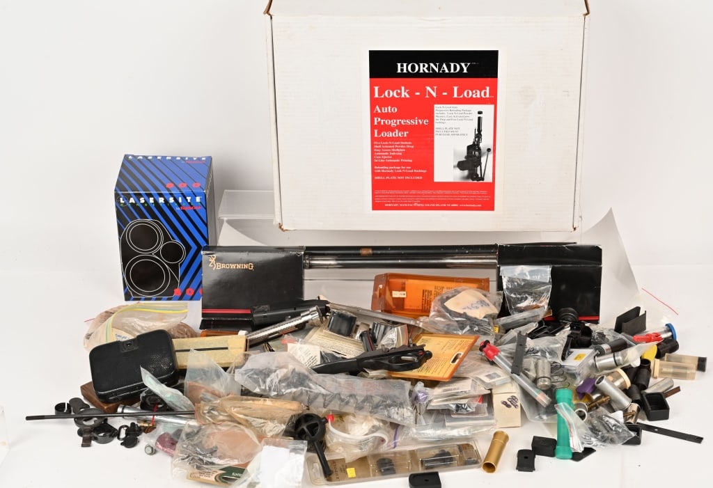 LOT OF RELOADING & PSTOL/RIFLE PARTS: This lot contains: (1) Hornady Lock-In-Load Auto Progressive Loader (1) Hornady small pistol rotor assembly (1) Tasco Laser site 800 Assorted choke tubes, scope mounts/rings, misc gun parts