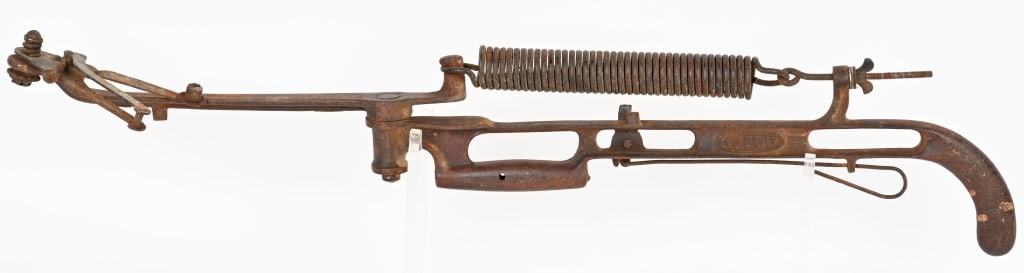 DuPONT CAST IRON PISTOL GRIP SKEET THROWER: Original DuPont cast iron skeet thrower for clay pigeons. Complete and original with pistol grip. 34" Very Good