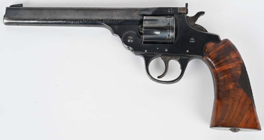 IVER JOHNSON SUPERSHOT SEALED EIGHT REVOLVER: SERIAL NUMBER: L31178. BARREL: 6". CALIBER: .22. MANUFACTURED: 1932-1958. Among Iver Johnson's finest work was the Super Shot Sealed Eight, a series of large-frame, top-break .22 rim fires produced in