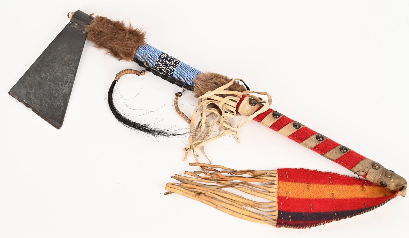 REPRODUCTION NATIVE AMERICAN TOMAHAWK: Tomahawk has chipping at the edge of the axe head and general wear.