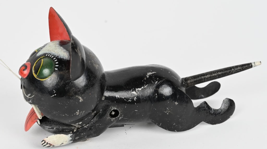 PREWAR JAPAN TIN WINDUP BLACKCAT FELIX: early painted tin windup Felix The Cat knockoff. All original with nice details. Works. Unusual toy. 6 1/2" Excellent