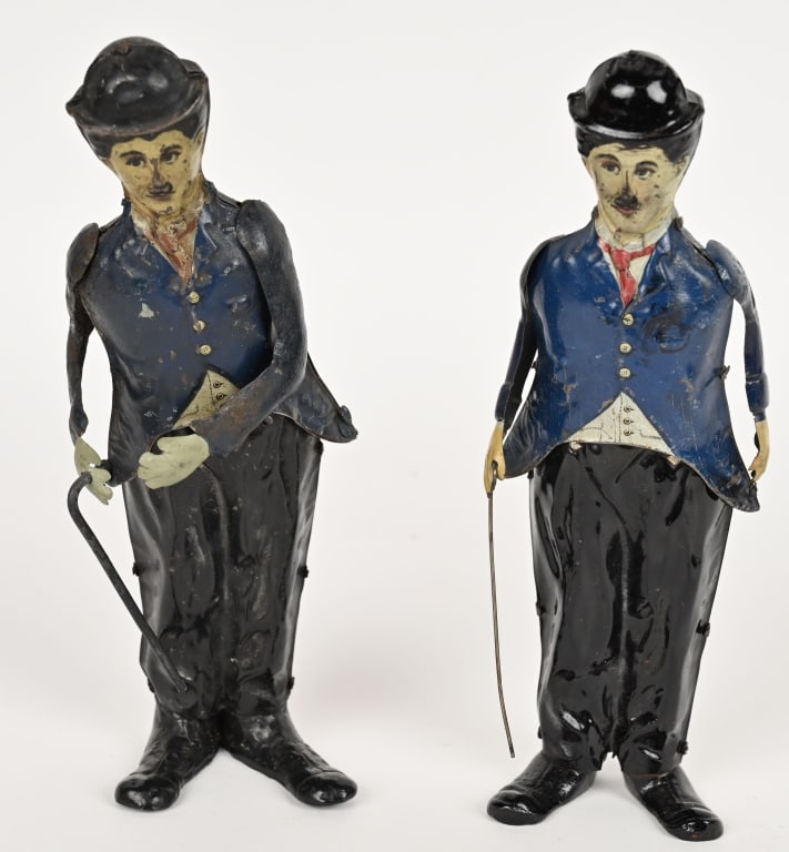 2- B&R TIN WINDUP CHARLIE CHAPLIN WALKERS: Nice pair of tin windup Charlie Chaplins. Arms are repalced. One has new lead feet. Only 1 works work. 8 1/2" Very Good-Excellent