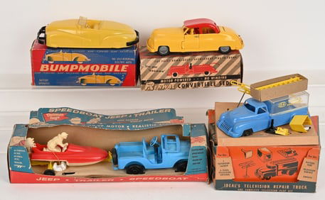 4- PLASTIC TOY VEHICLES w/ BOXES
