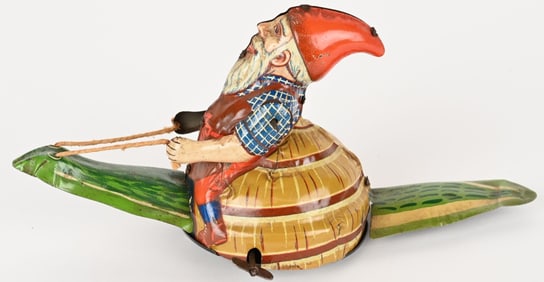 GERMAN TIN WINDUP GNOME RIDING SNAIL