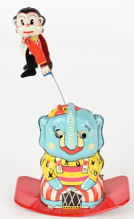 JAPAN TIN WINDUP ELEPHANT & MONKEY ACROBAT: Great looking toy. All original and complete. Works. 8" Excellent