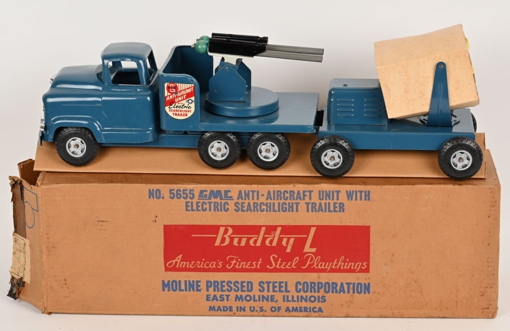 BUDDY L 5655 GMC ANTI AIRCRAFT TRUCK w/ BOX: Buddy L Anti Aircraft Truck with search light in the original box. New Old stock, unplayed with still has inserts. There is some discoloration on grill. 24" Excellent