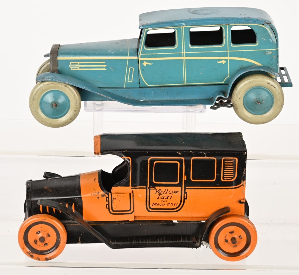 CHAD VALLEY TIN WIINDUP SEDAN & CHEIN YELLOW TAXI: Lot includes: 1. 9" Chad Valley tin windup Sedan, not working, Excellent, 2. 8" Chein tin windup Yellow Taxi, windup works, Excellent