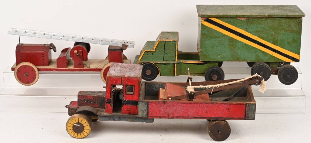 3- FOLK ART WOODEN TRUCKS: Includes Tow Truck Fire Truck, and Semi Truck. All wood construction. All have great Folk Art look. Largest 30" Very Good-Excellent