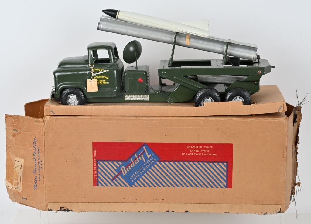 BUDDY L INTERCONTINENTAL MISSILE LAUNCHER w/ BOX: New Old Stock never played with. Still has original Kerr's Store price tag. Comes in Box with Inserts. 21" Excellent