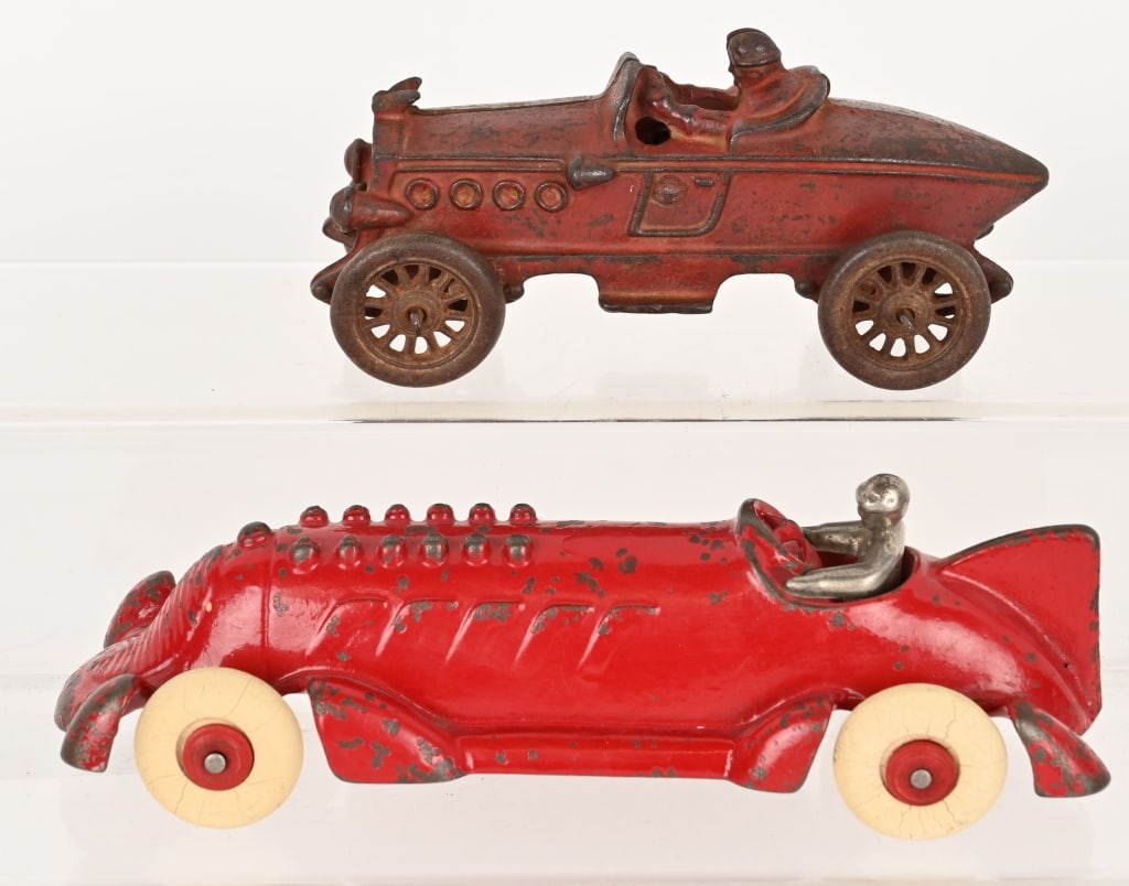 2- A.C. WILLIAMS CAST IRON RACE CARS: Lot includes: 1. 6" largest size port hole race car. No cracks or repairs, worn paint. Good-Very Good, 2. 8 1/2" 12 cylinder race car. Nice condition with original paint, driver and tires. Excellent