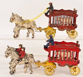 2- KENTON OVERLAND CIRCUS WAGONS w/ BEARS: Lot includes 2 Kenton Overland Circus wagons with Polar Bears. No cracks or repairs. One has the original horse riders. Condition varies. 12 1/2" Very good