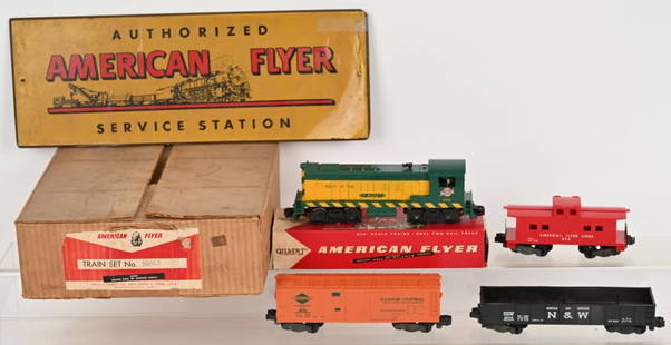 AMERICAN FLYER 5605-T TRAIN SET & SIGN: includes 355 C&NW Baldwin Diesel, 802 Reefer, 804 Gondola, 806 Caboose, and Accessories. Boxed with set box. All in nice original condition. Comes with American Flyer Service Station Sign.