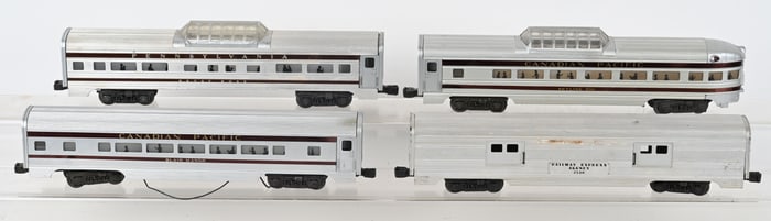 4- LIONEL ALUMINUM TRAIN CARS