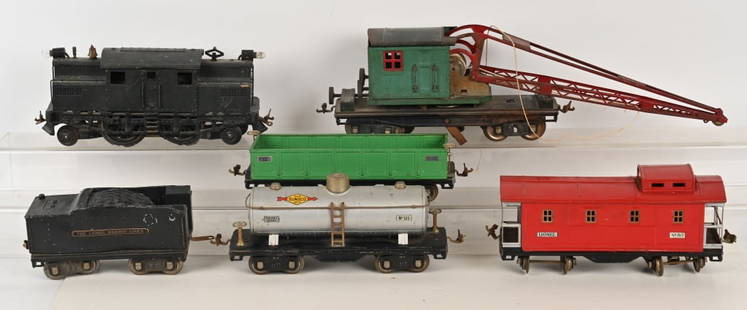 LIONEL STD GA LOT: Lot includes Engine, Crane Car, Sunoco Tank Car, Gondola, and Caboose. Conditions vary. Conditions vary AS-IS
