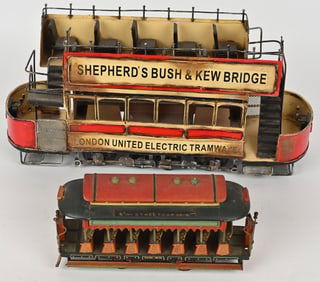 2- TIN TOY TROLLEYS