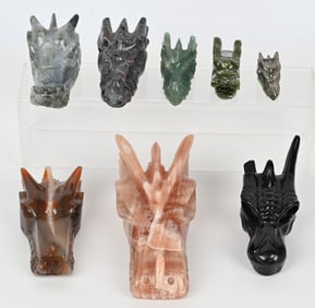 8- CARVED STONE DRAGON HEADS