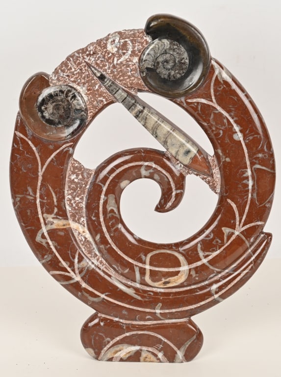 LARGE FOSSIL SCULPTURE: Great looking fossil sculpture with w Ammonites and a Orthocera. Nicely shaped and polished. 18" by 13". Excellent