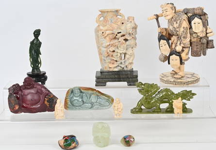 ASIAN CARVINGS JADE, JASPER & MORE: Nice lot of Asian carvings and art. Lot includes: 1. 9" Jade Dragon vase with chip at lip, 2. 6" Jasper carved Buddha, 3. 7" green jade resin dragon, 4. 5 1/4" Carved Jade Buddha. 5. 5 1/2" carved Jad