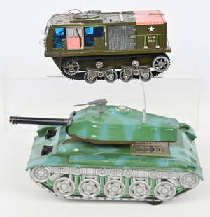 2- JAPAN TIN BATTERY OP MILITARY VEHICLES: Lot includes: 1. 10" Cragstan tin tank, worked when tested, Excellent, 2. 8" M-4 930 tracked vehicle. Not working. Excellent