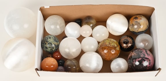 LARGE LOT OF CARVED STONE SPHERES