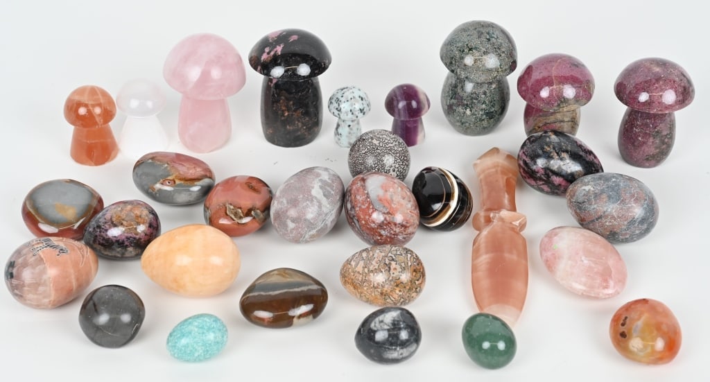 30- CARVED & POLISHED STONES: Lot includes carved eggs, mushrooms, a dagger, and more. Made from different stone specimens. Largest is 7 3/4"