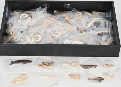 150+ ALASKAN CARVED BONE PENDANTS