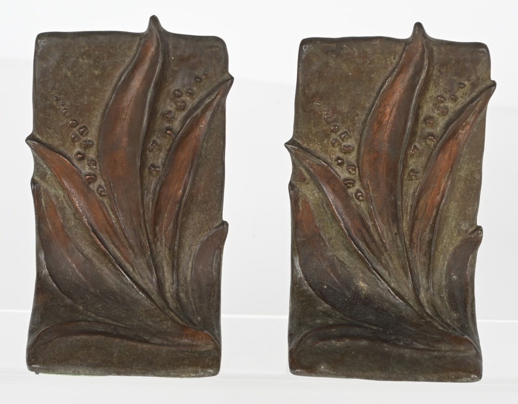 EMILIO MARAFFI BRONZE LILY BOOKENDS: Pair of beautiful bookends marked on the back "Emilio Maraffie SAA." In the early 1900's Maraffi did some work for Cartier. The bookends have an Arts & Crafts look. Excellent