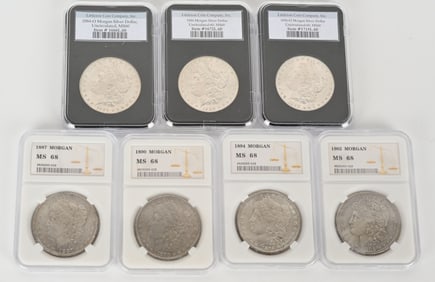 7- MORGAN SILVER DOLLARS