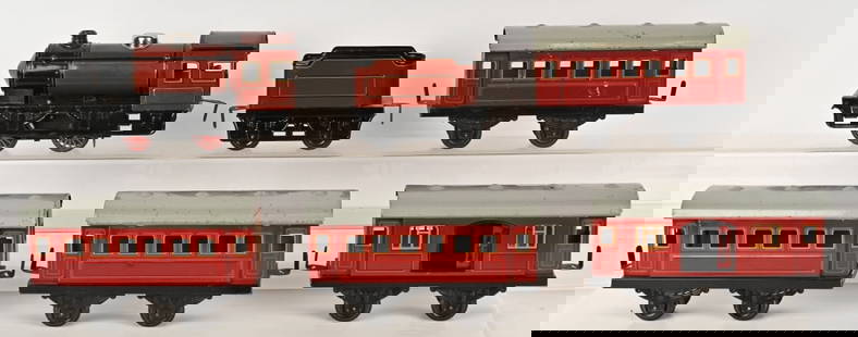 BUBB CLOCKWORK ENGINE & TENDER w/ PASSENGER CARS: Great looking 1 Gauge European Engine and Tender. Comes with Baggage Car and 3 Passenger Cars. All in very nice original. Clockwork works great. A very impressive Train Set, Excellent