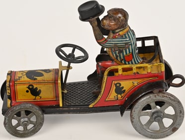 DISTLER TIN WINDUP MONKEY CAR