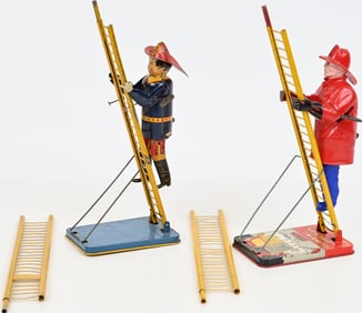 2- MARX WINDUP CLIMBING FIREMAN