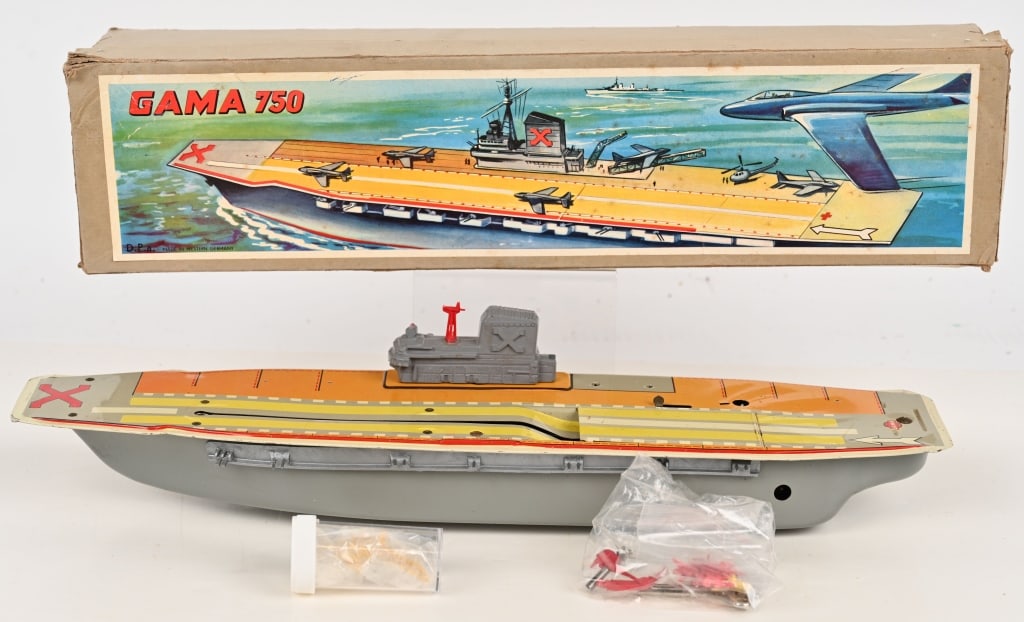 GAMA 750 AIRCRAFT CARRIER w/ BOX: All original and looks never played with. Comes with planes and accessories. Boxed 18" Excellent