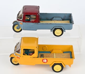 2- JAPAN TIN FRICTION 3 WHEEL TRUCKS