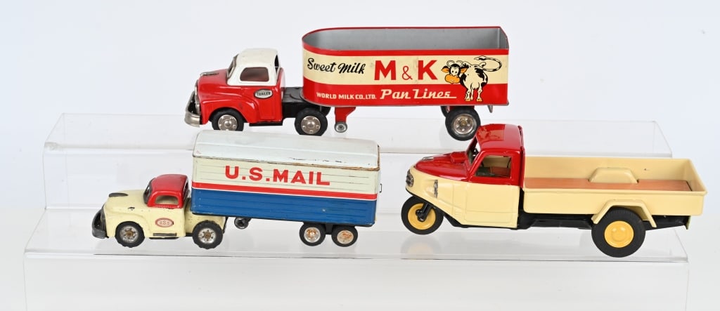 3- JAPAN TIN FRICTION TRUCKS: Nice looking trucks. 3 Wheel is restored. largest 12" Excellent