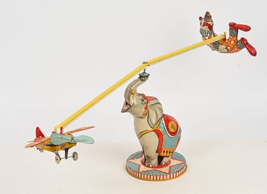 UNIQUE ART TIN WINDUP FLYING CIRCUS