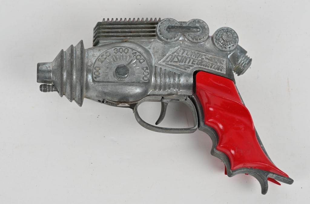 HUBLEY ATOMIC DISINTEGRATOR: Great looking futuristic Cap Gun. All original condition. Has initials in bottom of grip. 8" Excellent