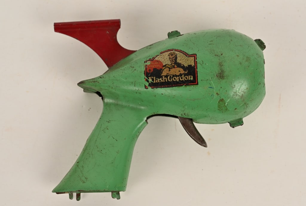 MARX FLASH GORDON SIGNAL PISTOL: All original with decent paint and decals. Missing some pieces. Great for parts.8" Very Good