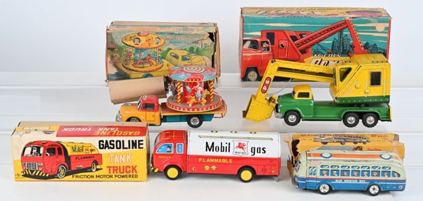 4- JAPAN TIN FRICTION TRUCKS w/ BOXES