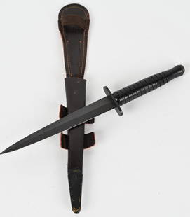 WWII BRITISH SYKES FAIRBAIRN FIGHTING KNIFE WW2: World War II era Fairbairn Sykes commando fighting knife. Blade is blued finish, near 50% with light wear at the tip and age wear. wood handle shows minimal wear and is solid. The scabbard is in excel