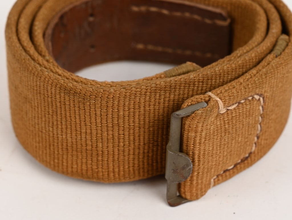 WWII NAZI GERMAN WEHRMACHT ENLISTED TROPICAL BELT: Roughly, 45mm wide, 100cm, long, woven, khaki/olive canvas web construction waist belt with an olive drab painted, steel buckle catch and a web retaining tongue both intact. The buckle catch end of th